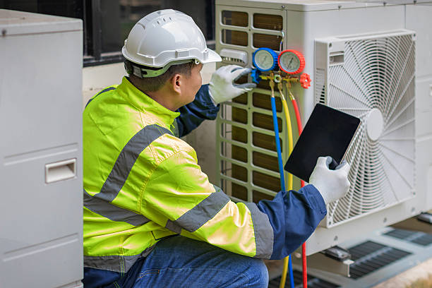 Professional Air Conditioning Repair technician working in Line Lexington, PA